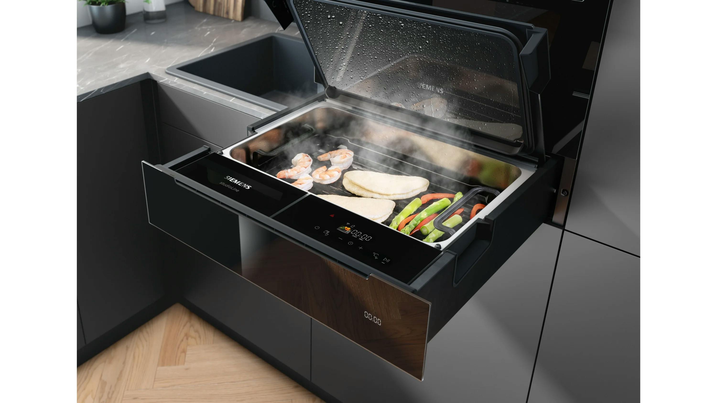 Wel stomen, geen stoomoven? Dan is de stoomlade van Siemens echt iets voor jou